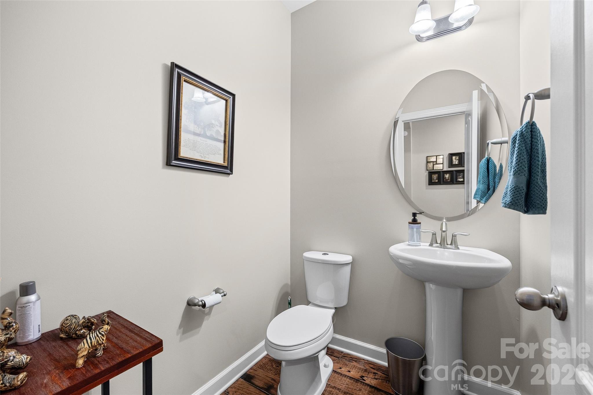 2054 Lometa Road York, SC 29745 - Photo 17 of 45 a bathroom with a toilet sink and mirror
