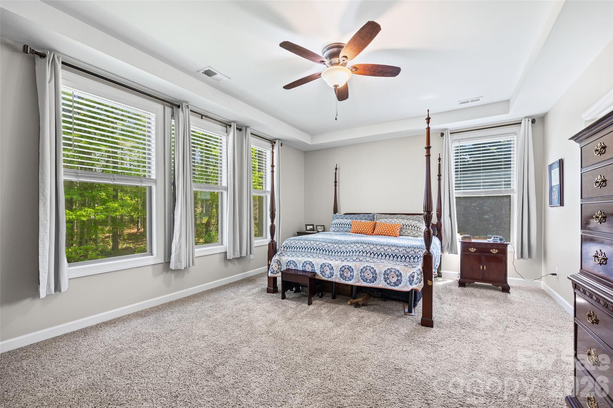 2054 Lometa Road York, SC 29745 - Photo 18 of 45 a bed sitting in a spacious bedroom next to a window
