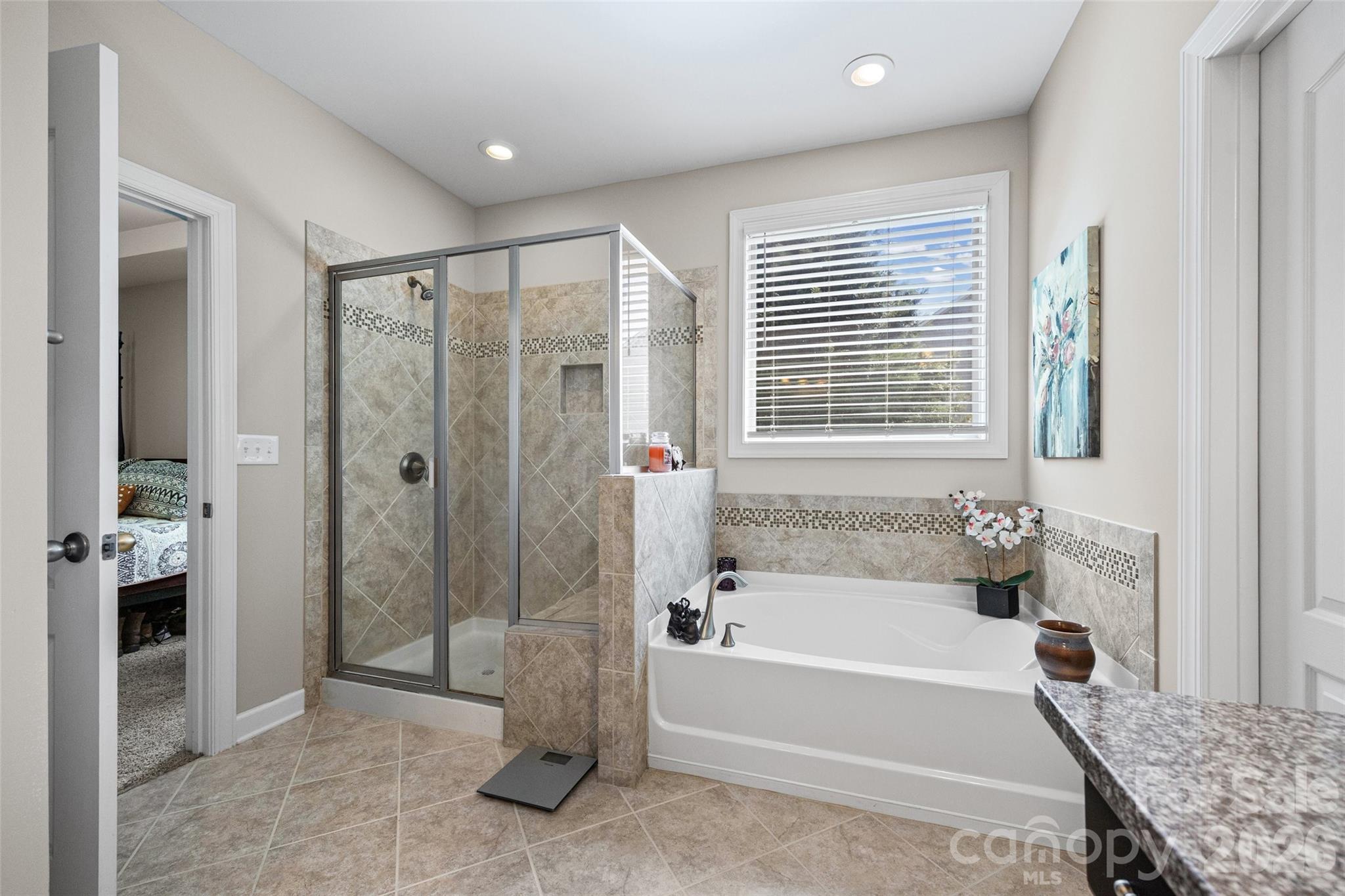 2054 Lometa Road York, SC 29745 - Photo 22 of 45 a bathroom with a granite countertop tub shower and sink