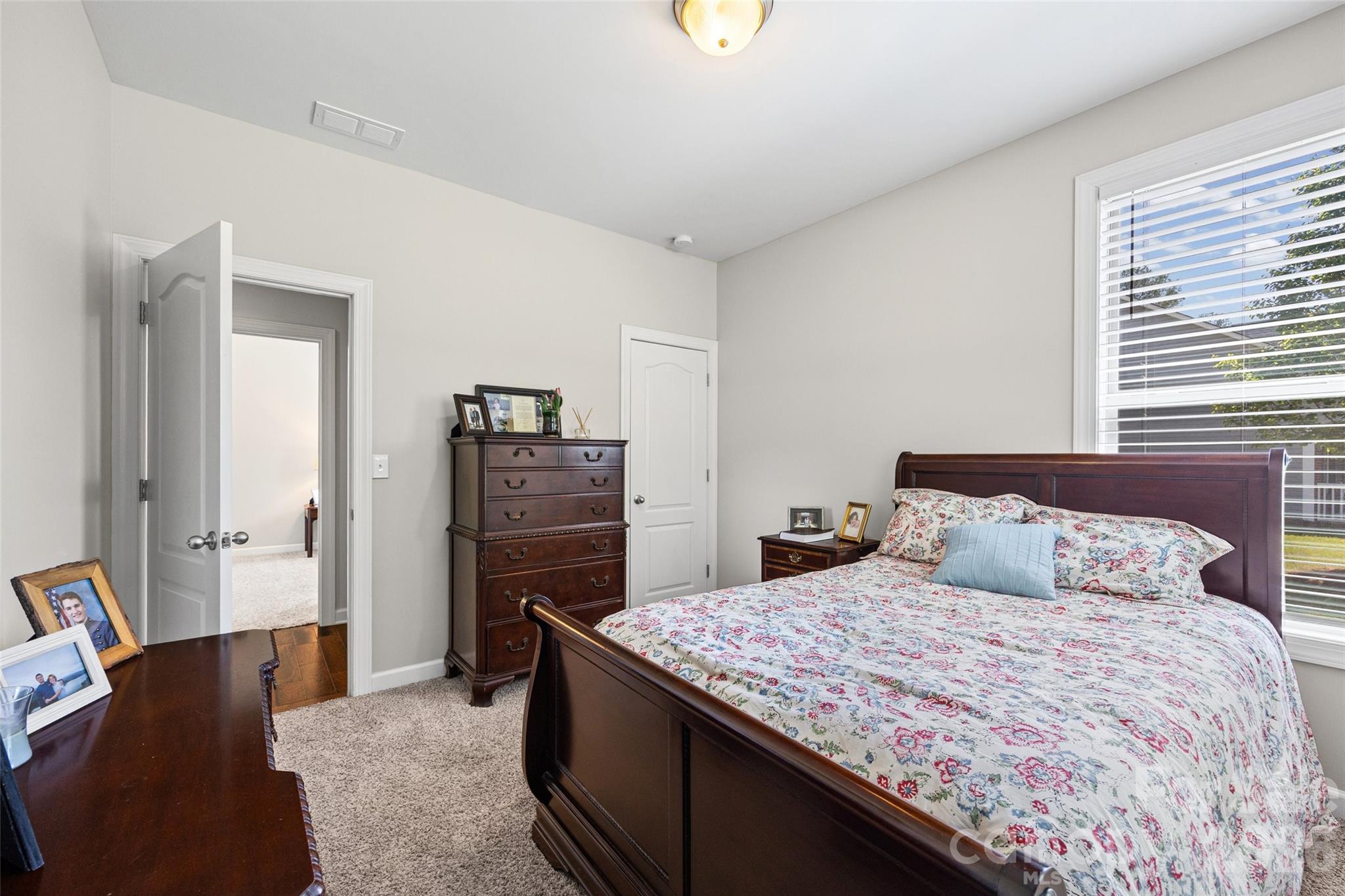2054 Lometa Road York, SC 29745 - Photo 27 of 45 a bedroom with a bed and dresser