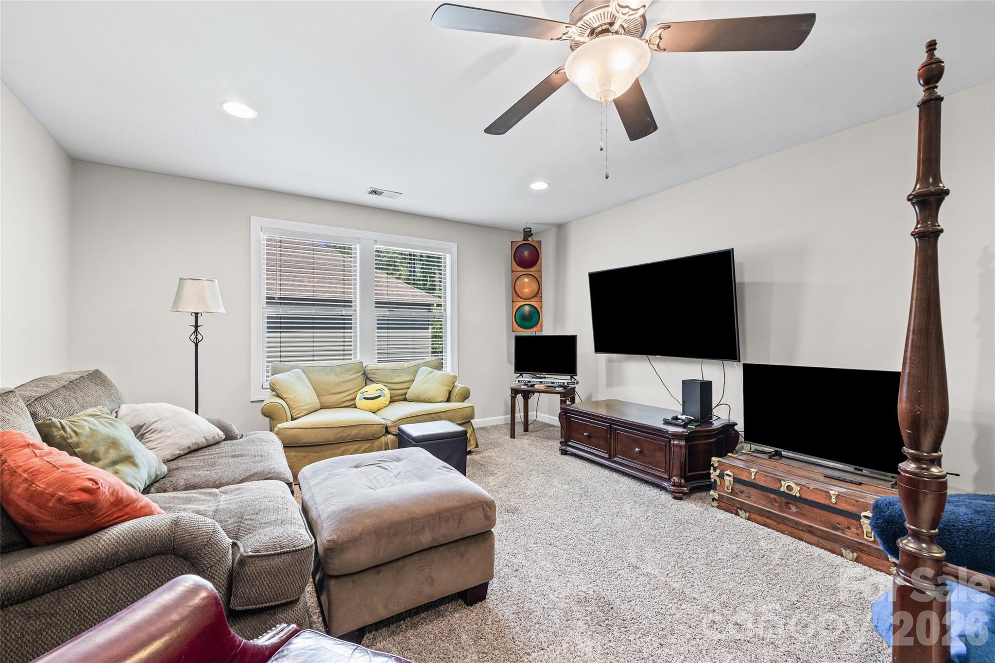 2054 Lometa Road York, SC 29745 - Photo 32 of 45 a living room with furniture and a flat screen tv
