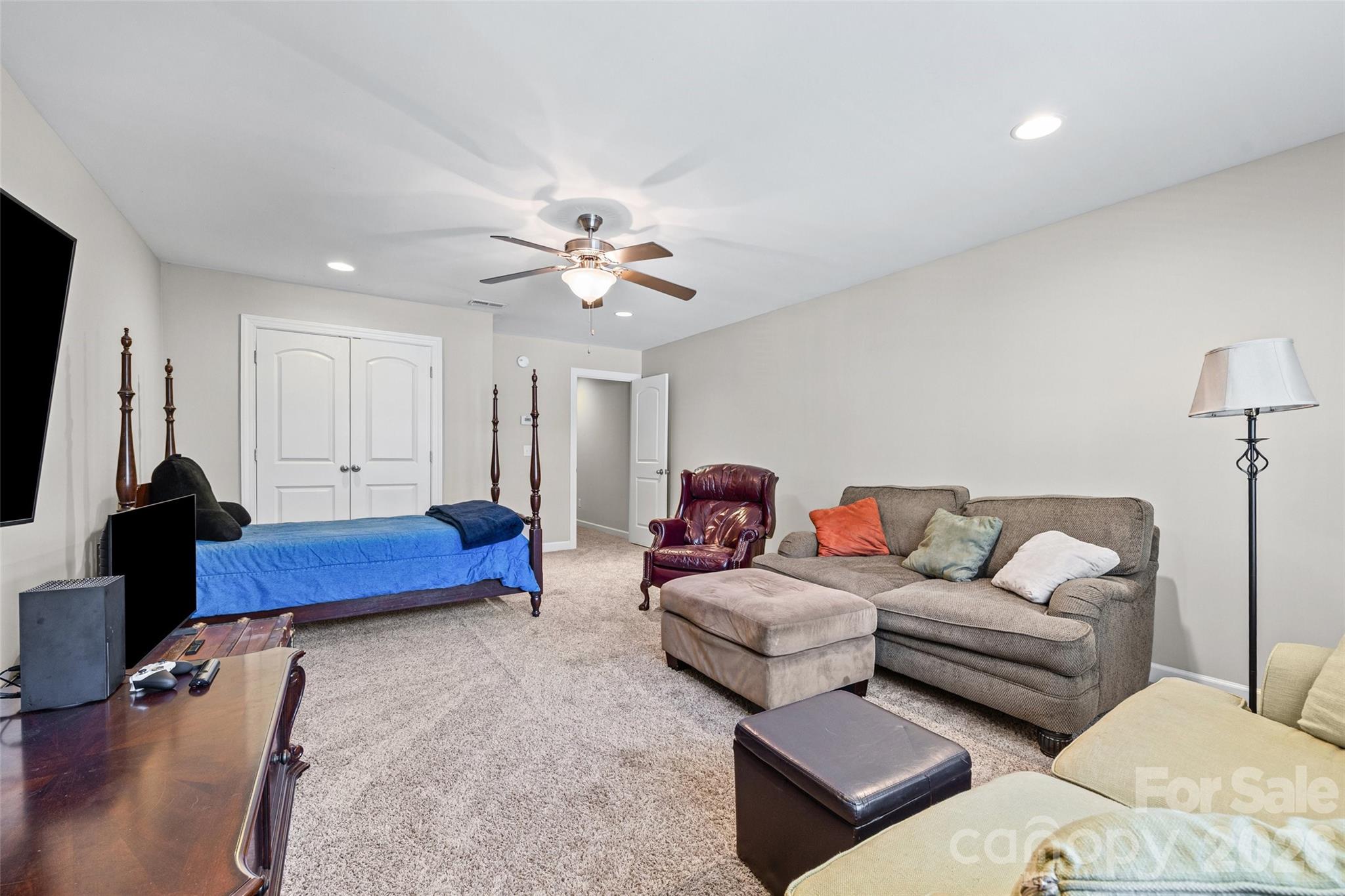 2054 Lometa Road York, SC 29745 - Photo 33 of 45 a living room with furniture and a chandelier