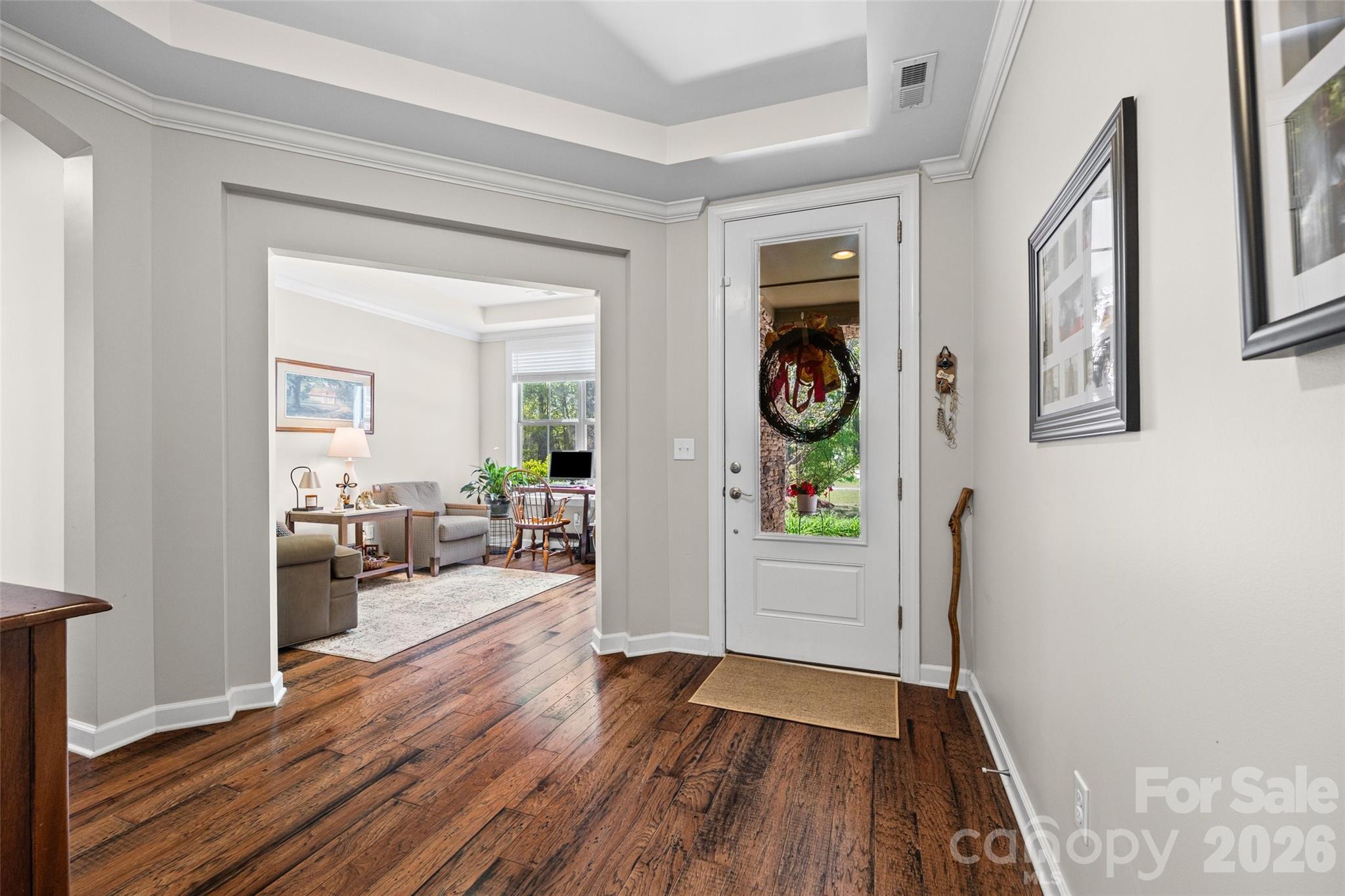 2054 Lometa Road York, SC 29745 - Photo 6 of 45 a view of a hallway view with wooden floor and living room