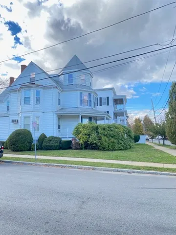a view of a back yard of the house