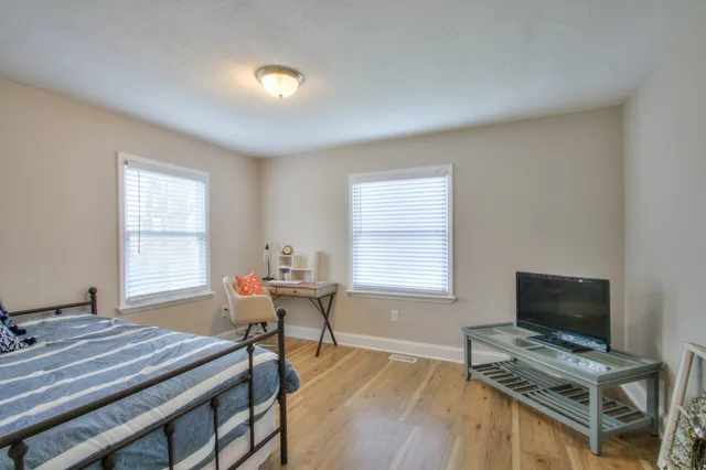 a workspace with furniture and window