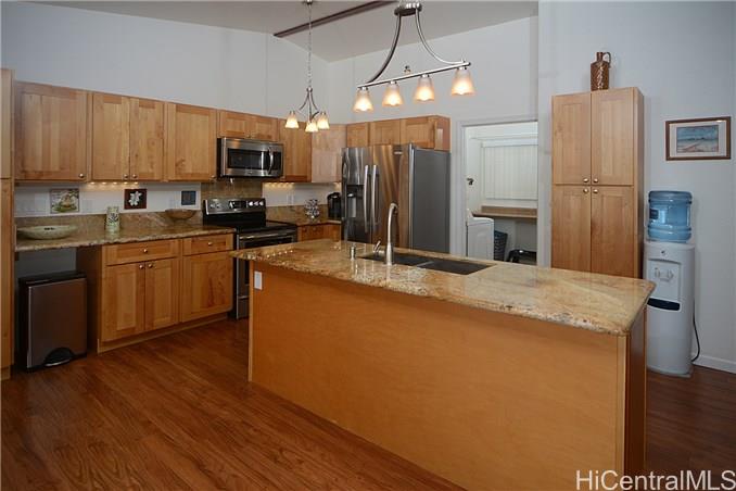 316 Elelupe Road, Unit A Honolulu, HI 96821 - Photo 1 of 1 a kitchen with stainless steel appliances granite countertop a refrigerator a stove top oven a sink and dishwasher