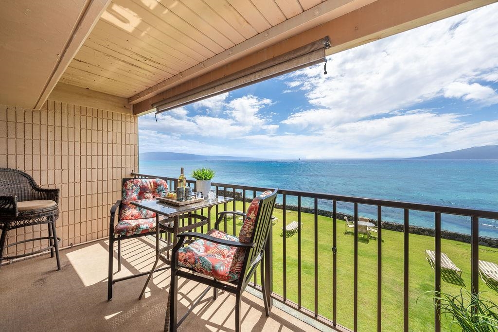 3785 Lower Honoapiilani Road, Unit 208 Lahaina, HI 96761 - Photo 4 of 50 a view of a balcony with chairs