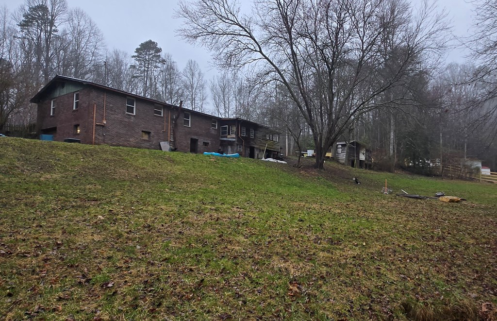 5134 Boardtown Road Ellijay, GA 30540 - Photo 14 of 41 a view of a house with a yard