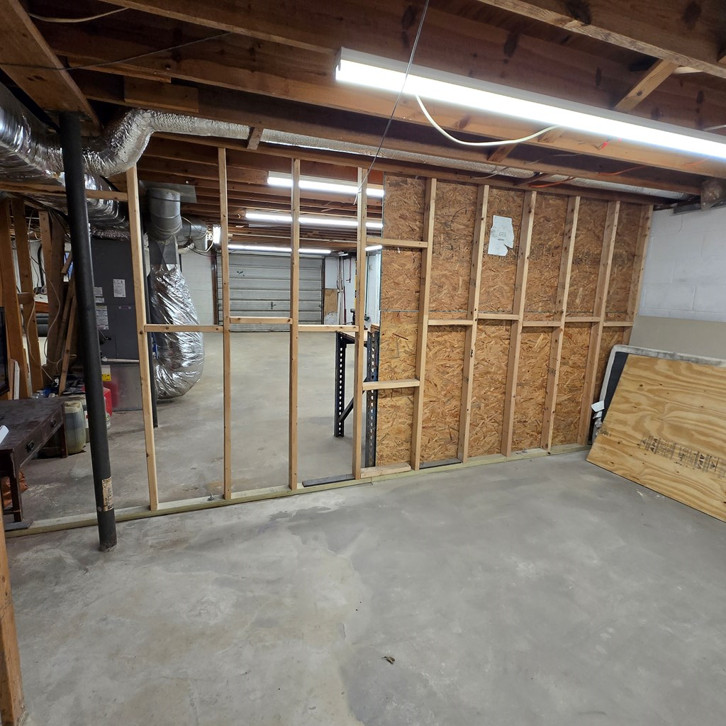 5134 Boardtown Road Ellijay, GA 30540 - Photo 24 of 41 a view of empty room with wooden walls