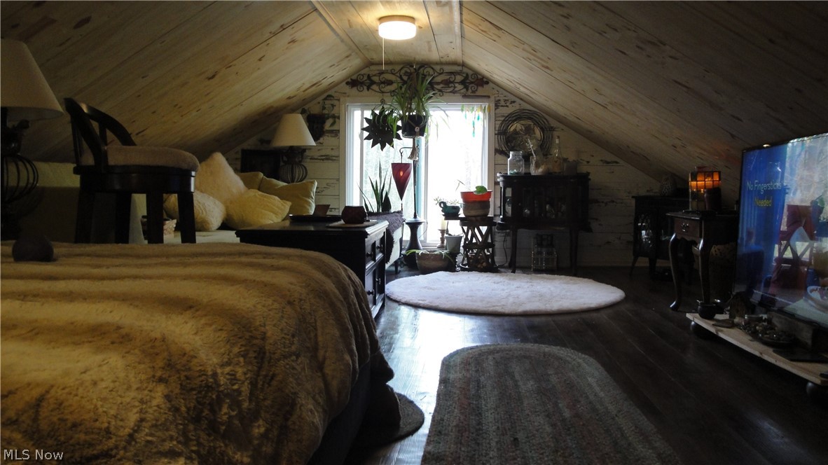 7515 Congress Road Lodi, OH 44254 - Photo 25 of 28 Bedroom with wood ceiling, vaulted ceiling, and dark wood-type flooring