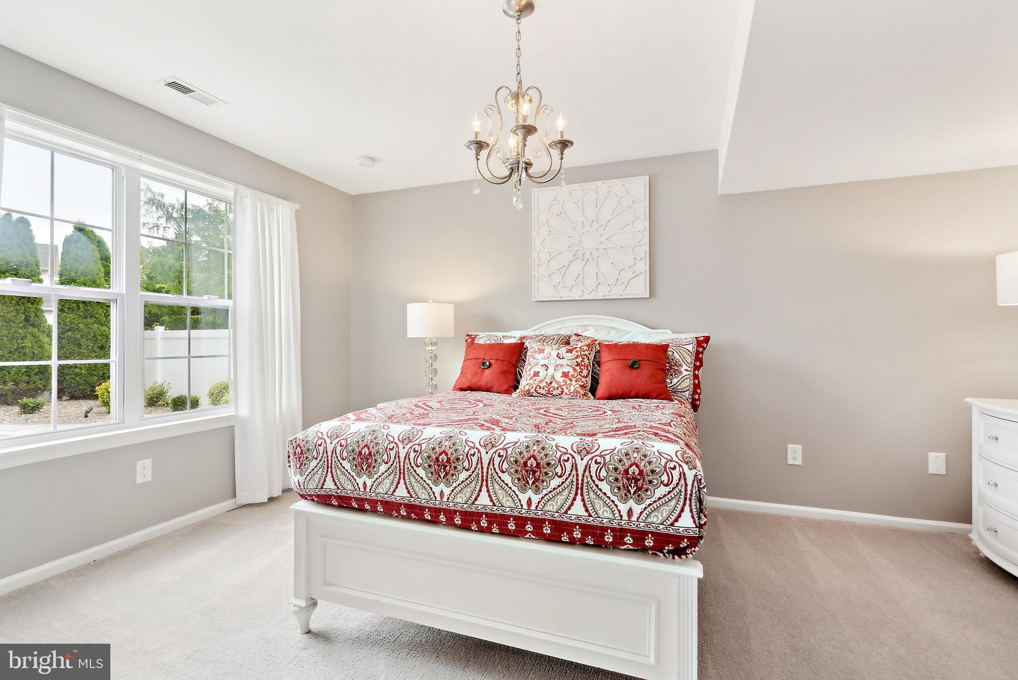 19 Phoenix Road Marlton, NJ 08053 - Photo 17 of 32 a bedroom with a bed and a window