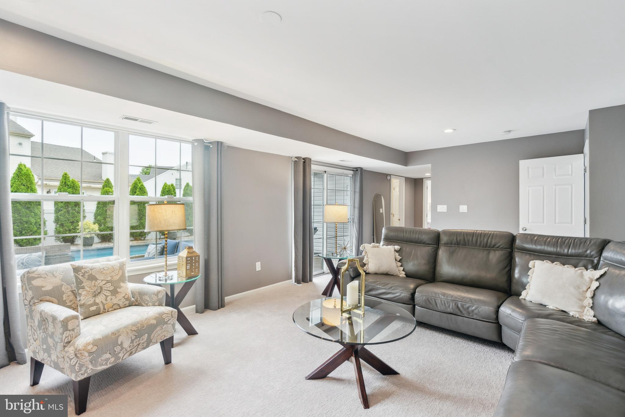 19 Phoenix Road Marlton, NJ 08053 - Photo 20 of 32 a living room with furniture and a large window