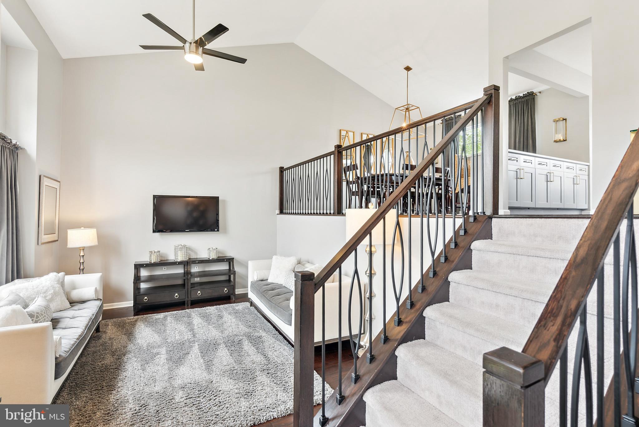 19 Phoenix Road Marlton, NJ 08053 - Photo 2 of 32 a living room with furniture and a flat screen tv
