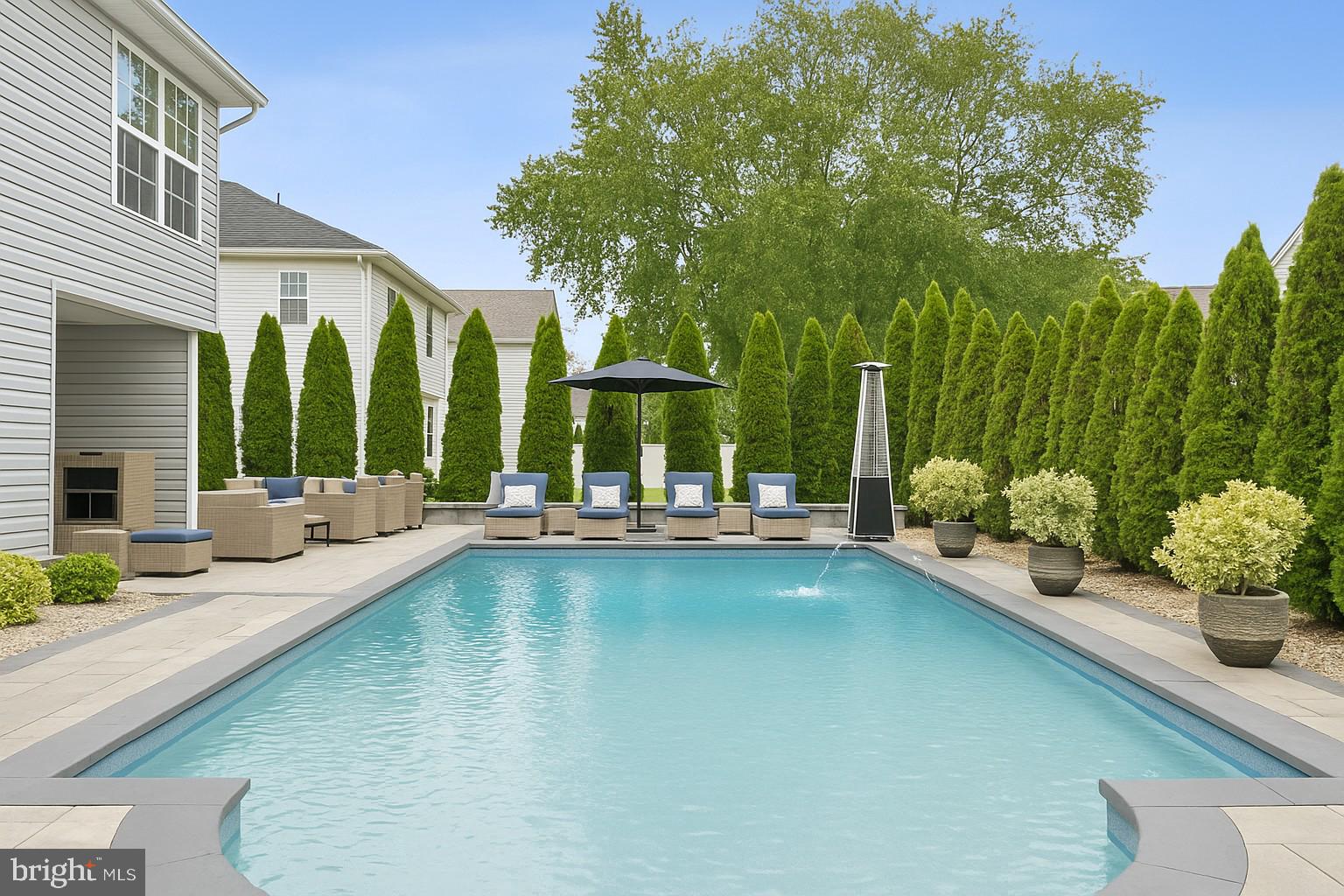 19 Phoenix Road Marlton, NJ 08053 - Photo 22 of 32 a view of swimming pool with outdoor seating and plants