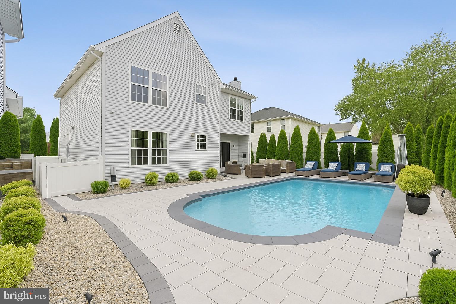 19 Phoenix Road Marlton, NJ 08053 - Photo 24 of 32 a view of swimming pool with outdoor seating