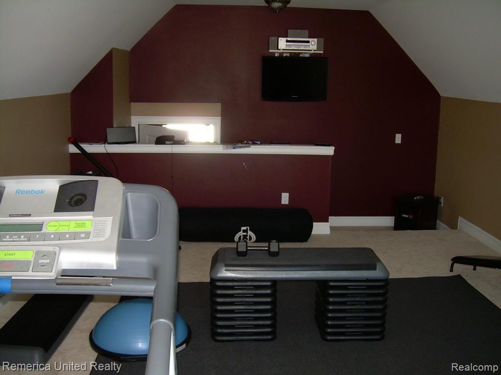 3467 East Commerce Road Commerce Township, MI 48382 - Photo 19 of 36 Entry level room adjacent to kitchen. Perfect for exercise room, playroom, extra storage, etc.