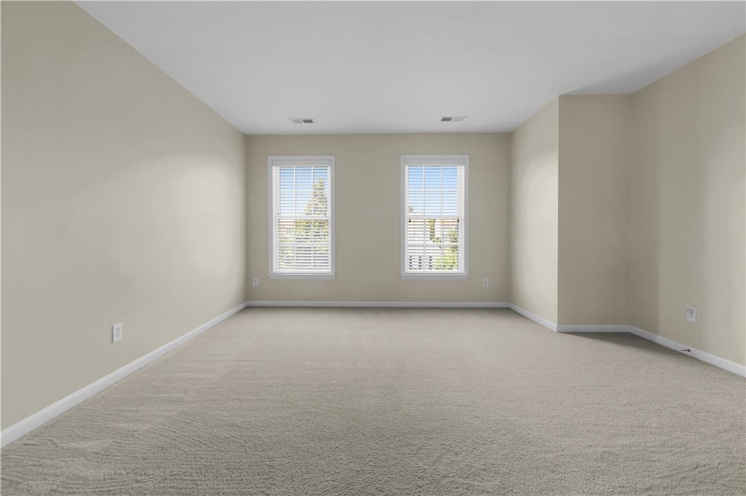 1709 Travers Road Breinigsville, PA 18031 - Photo 44 of 55 Two well-lit windows frame views in this generously proportioned room.