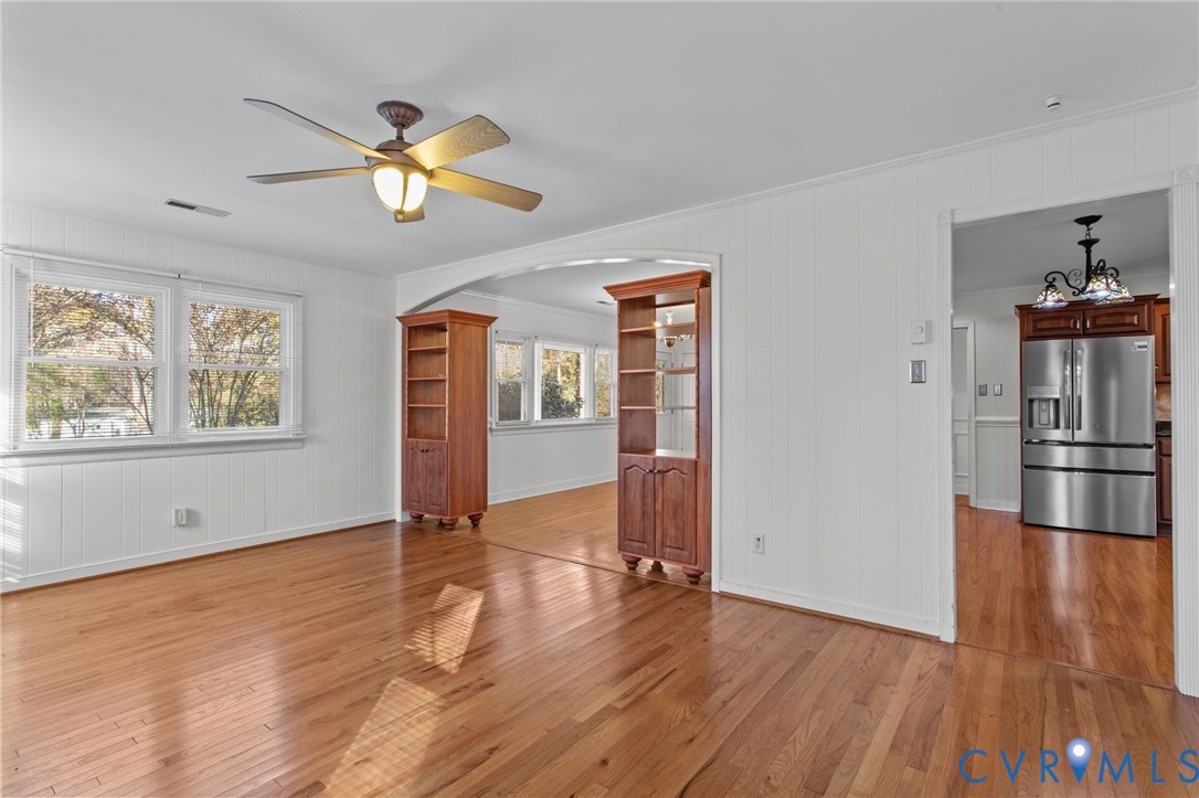 5359 Qualla Road Chesterfield, VA 23832 - Photo 12 of 49 a view of empty room with wooden floor and fan