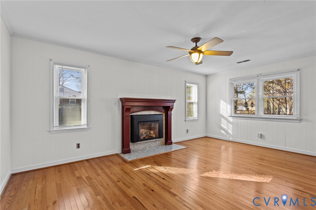 5359 Qualla Road Chesterfield, VA 23832 - Photo 13 of 49 a view of empty room with wooden floor and fan