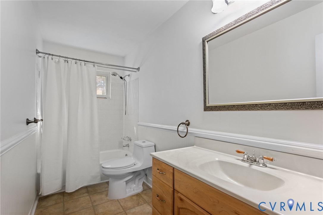 5359 Qualla Road Chesterfield, VA 23832 - Photo 22 of 49 a bathroom with a sink a toilet and shower