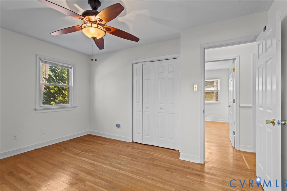 5359 Qualla Road Chesterfield, VA 23832 - Photo 25 of 49 a view of empty room with wooden floor and fan