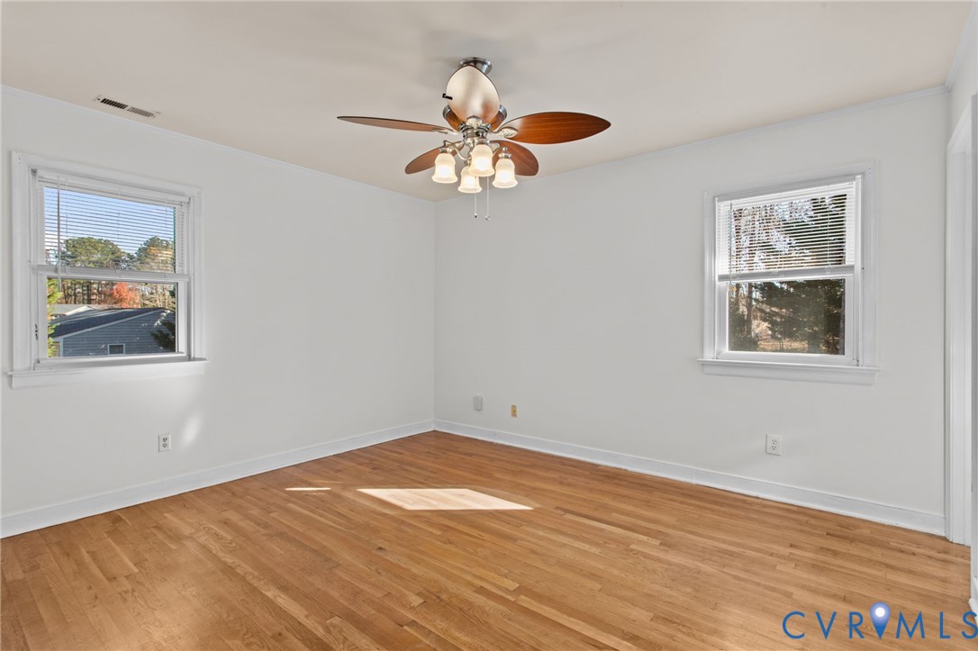 5359 Qualla Road Chesterfield, VA 23832 - Photo 26 of 49 a view of a big room with wooden floor closet and windows