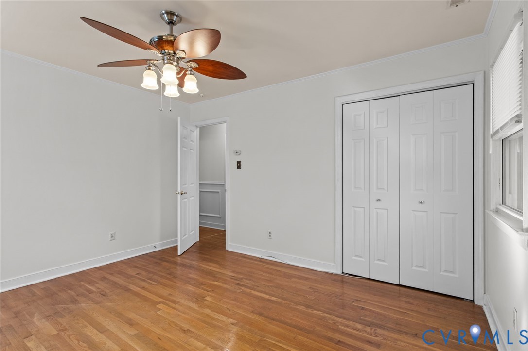 5359 Qualla Road Chesterfield, VA 23832 - Photo 27 of 49 a view of an empty room with wooden floor