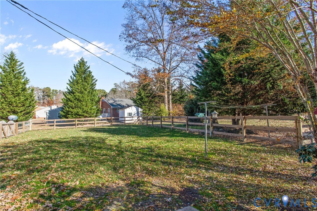 5359 Qualla Road Chesterfield, VA 23832 - Photo 40 of 49 a backyard of a house with table and chairs