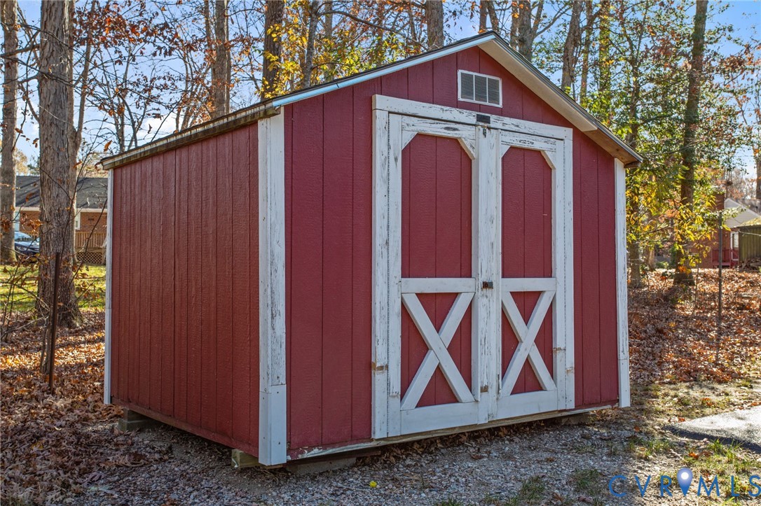 5359 Qualla Road Chesterfield, VA 23832 - Photo 42 of 49 a view of a small house with a yard
