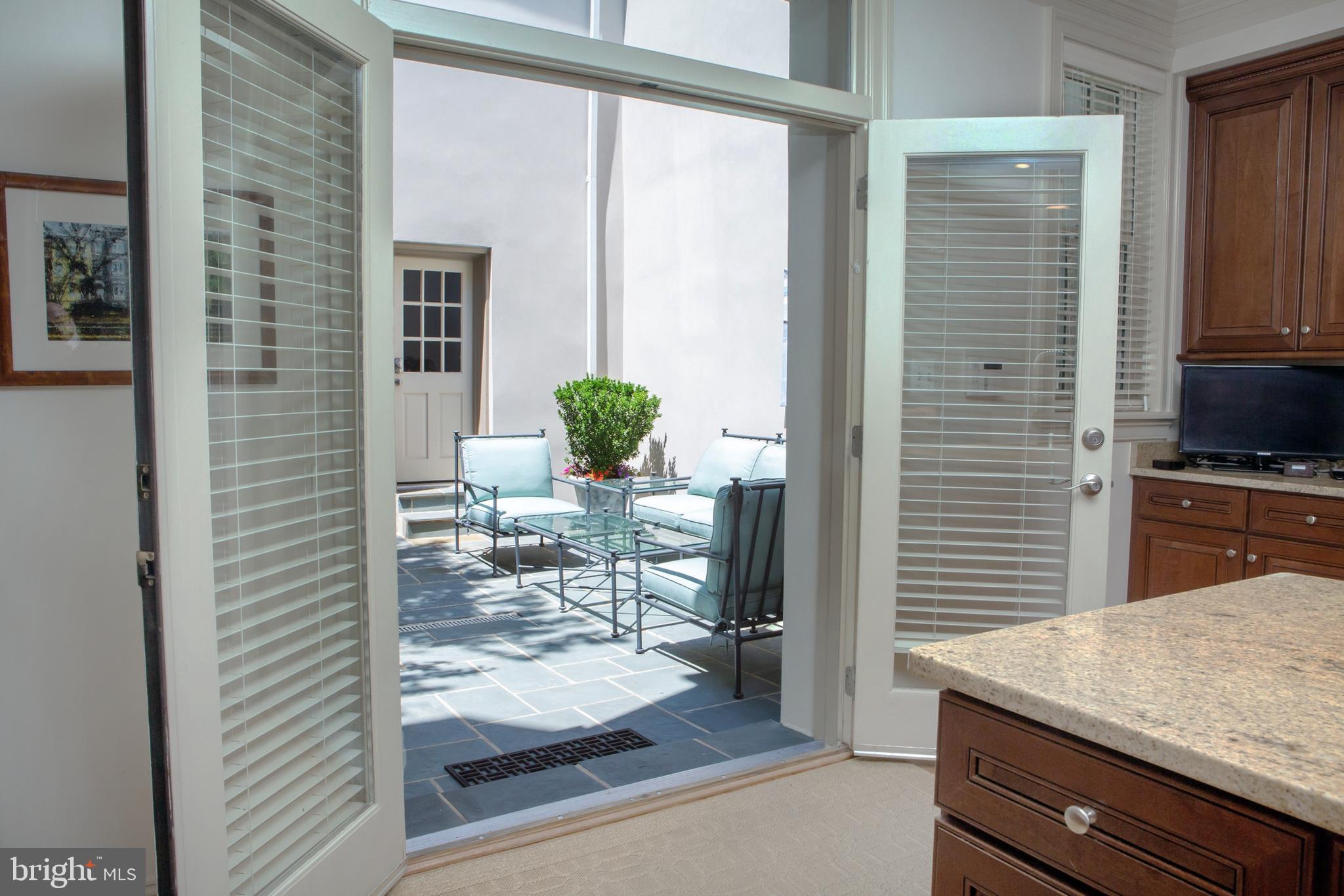 18 7th Street Northeast Washington, DC 20002 - Photo 10 of 53 Kitchen Opening Onto Serene Courtyard