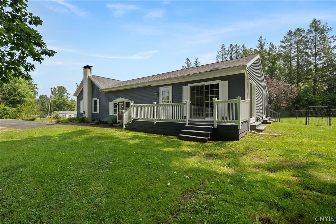 305 Howard Road Volney, NY 13069 - Photo 6 of 49 Side deck and fenced in area off screened porch.