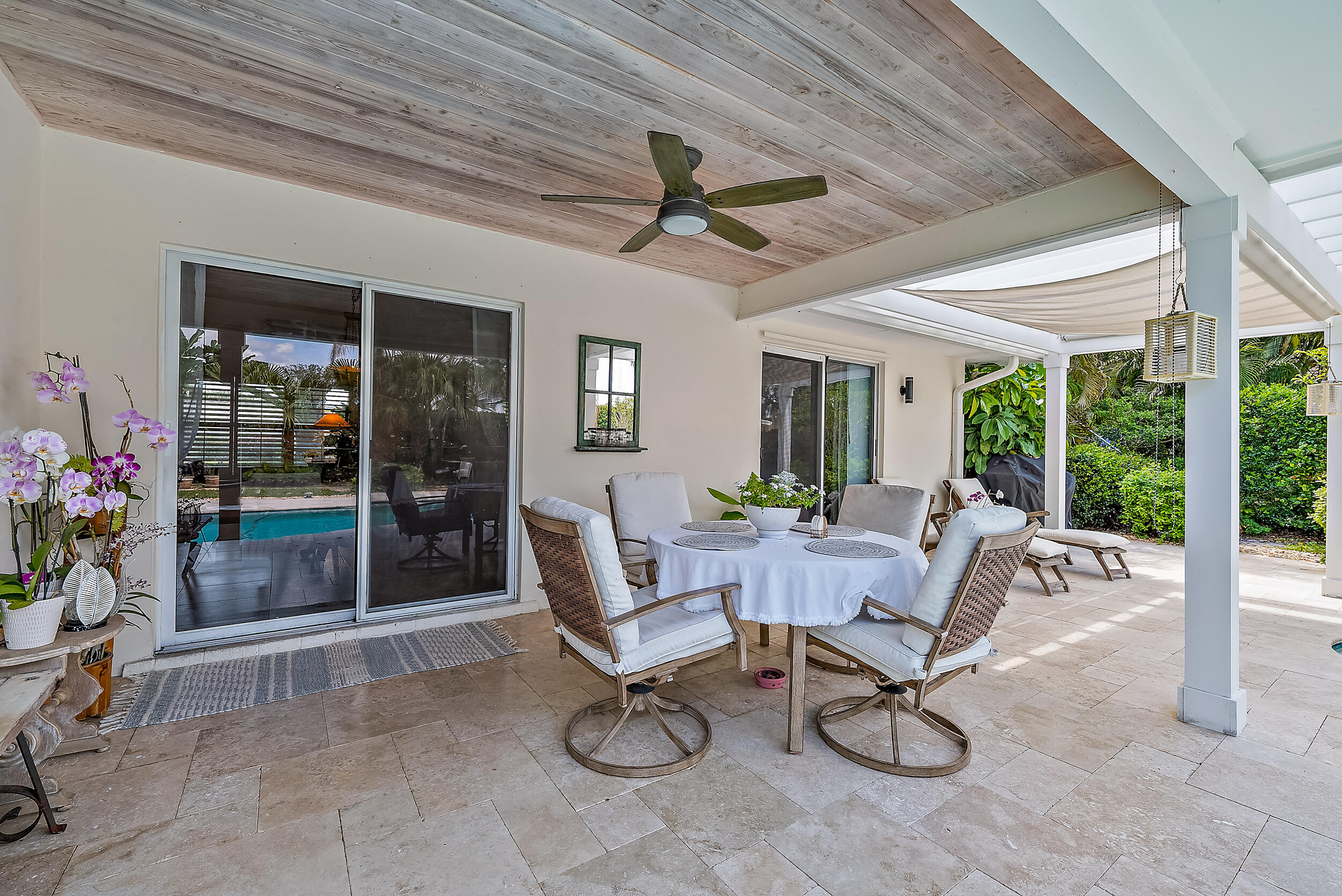 83 Fairview West Tequesta, FL 33469 - Photo 24 of 32 a living room with patio furniture