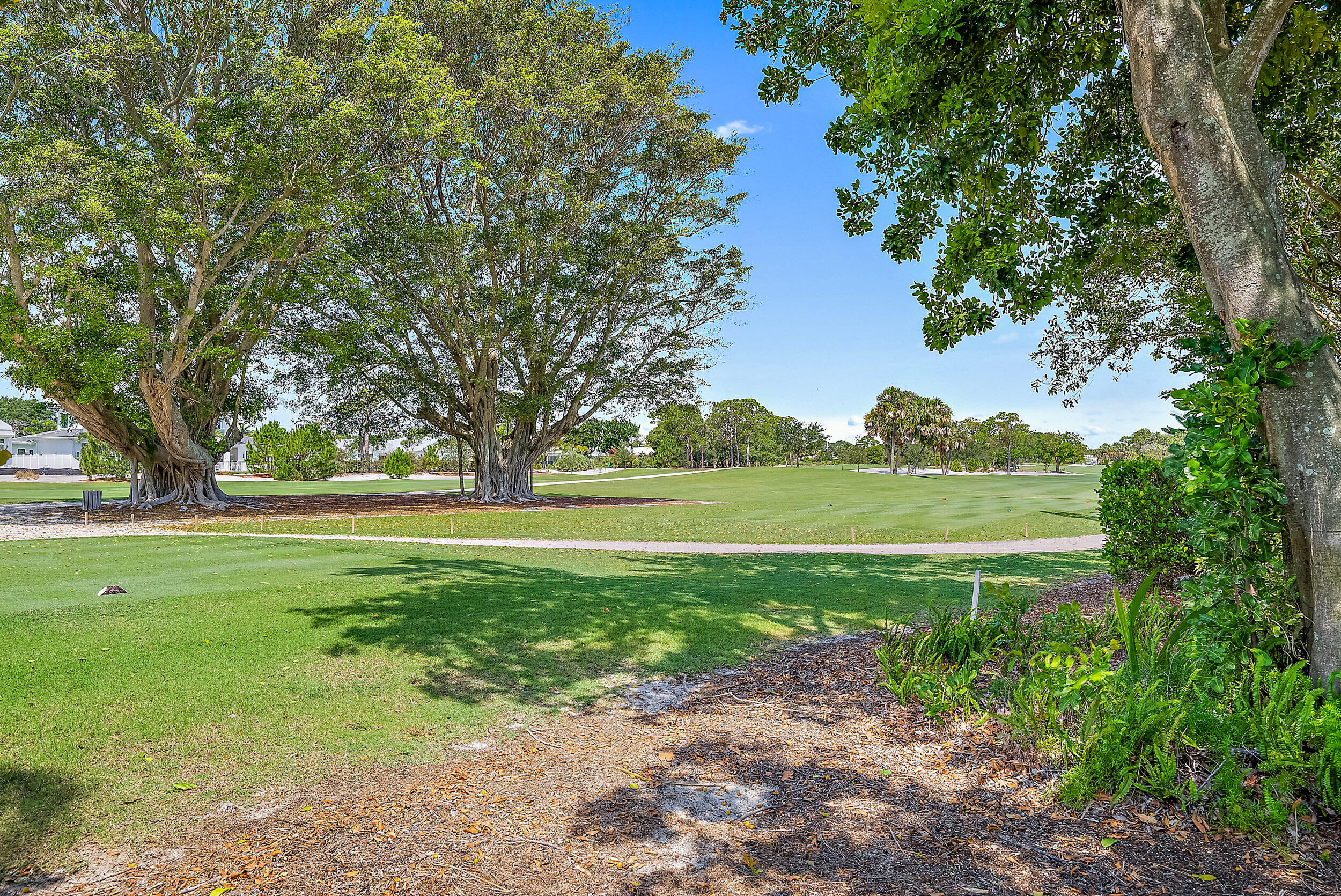 83 Fairview West Tequesta, FL 33469 - Photo 26 of 32 a view of a garden with an outdoor space