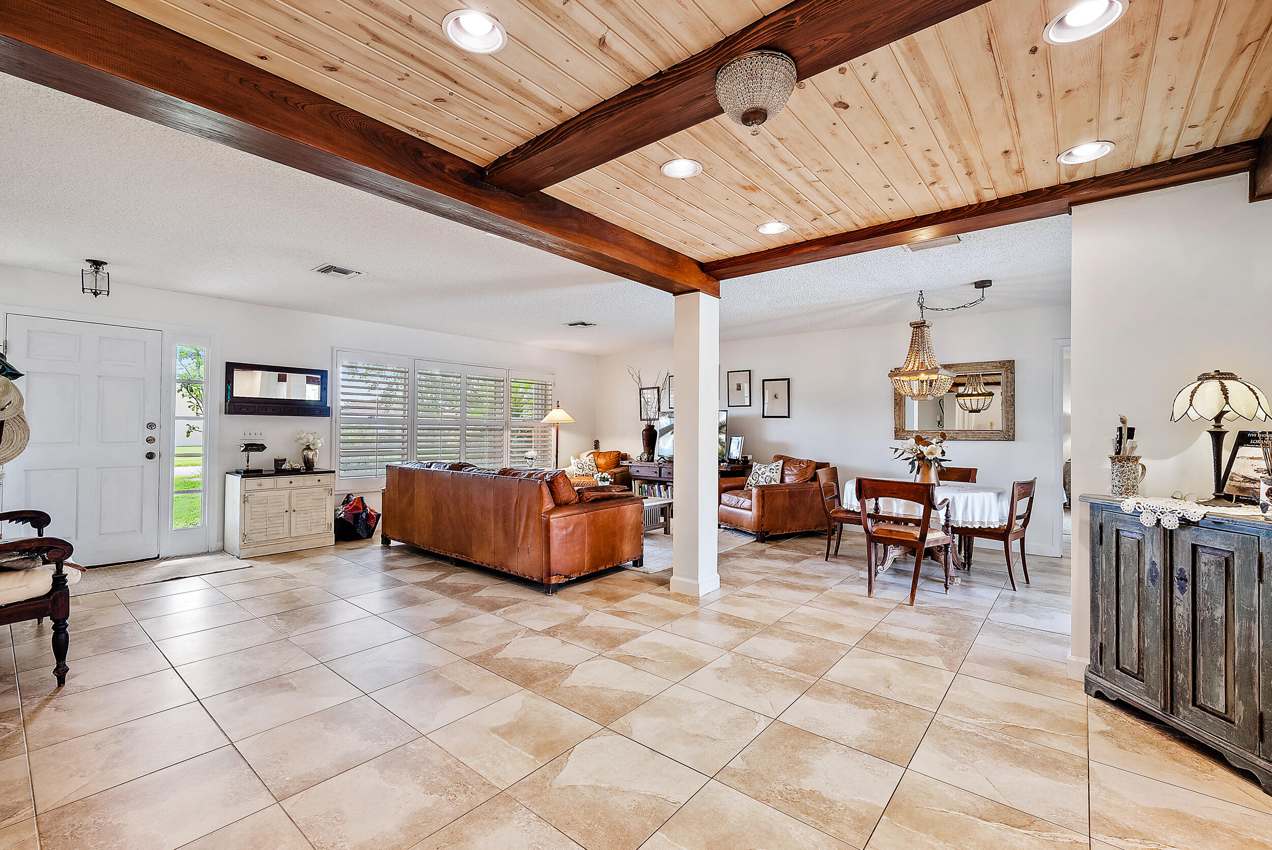 83 Fairview West Tequesta, FL 33469 - Photo 3 of 32 a living room with lots of furniture and lots of furniture