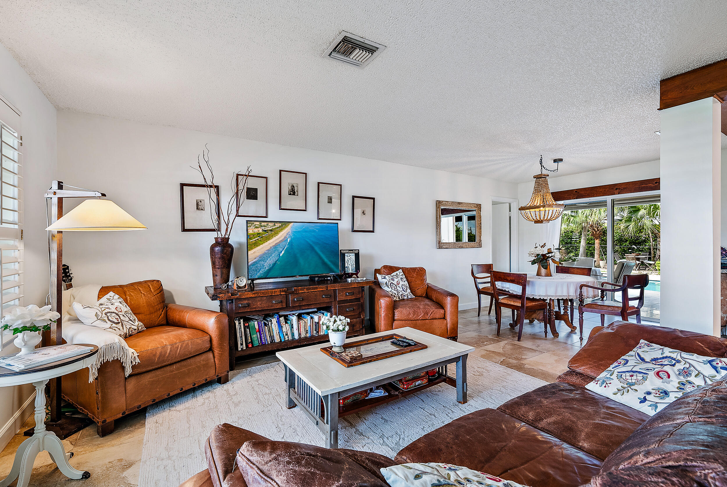 83 Fairview West Tequesta, FL 33469 - Photo 5 of 32 a living room with furniture and a window