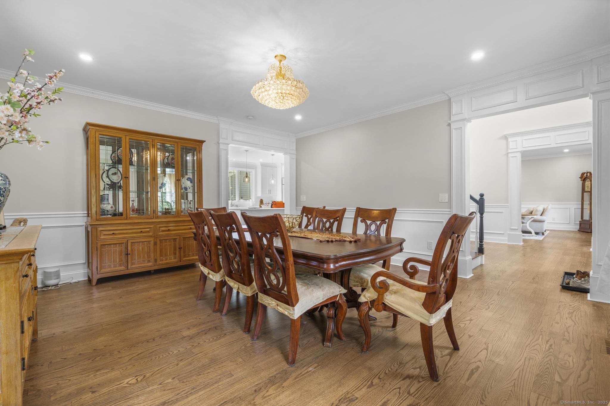 424 Racebrook Road Orange, CT 06477 - Photo 6 of 36 a dining room with furniture and window