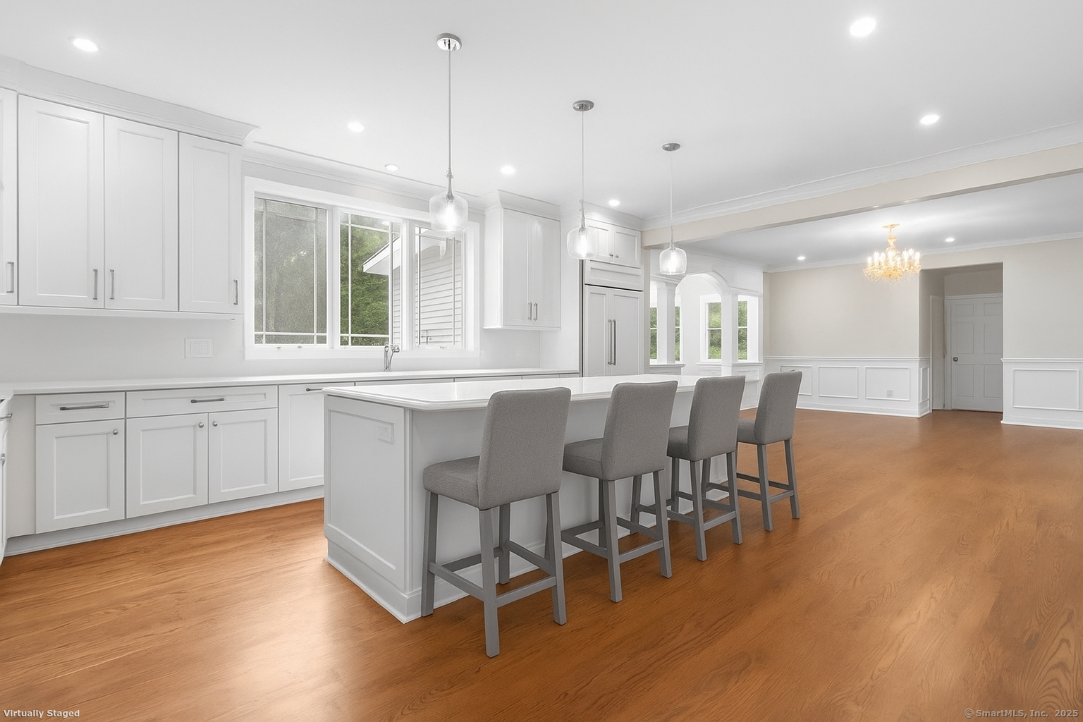 424 Racebrook Road Orange, CT 06477 - Photo 7 of 36 a large kitchen with a table and chairs