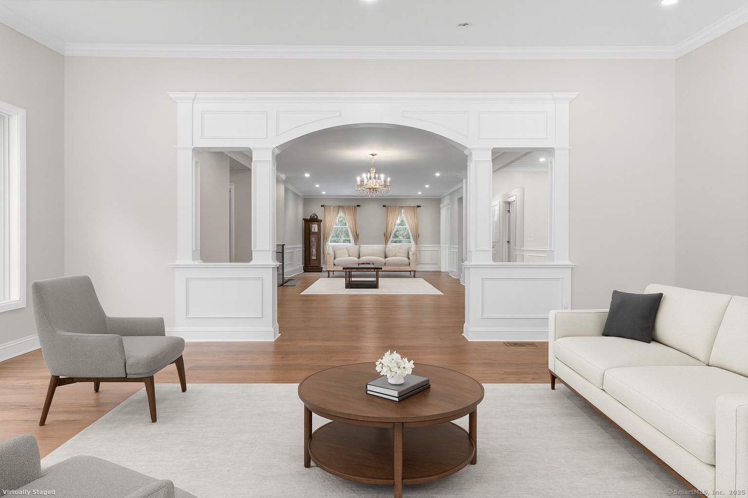 424 Racebrook Road Orange, CT 06477 - Photo 9 of 36 a living room with furniture and a wooden floor