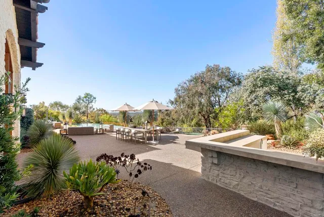 a view of a swimming pool with a patio