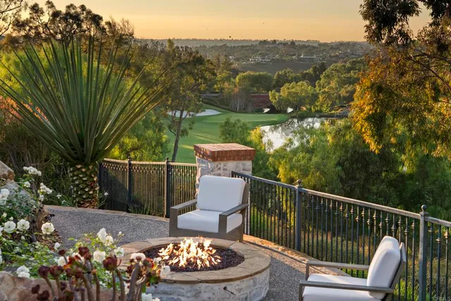 a view of a terrace with sitting area