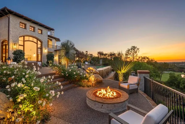 a backyard of a house with garden and patio
