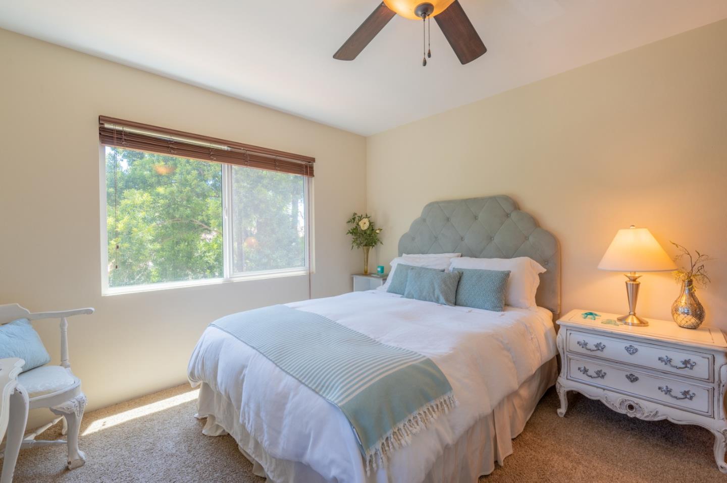 25324 Hatton Road Carmel, CA 93923 - Photo 14 of 19 a bedroom with a bed and a window