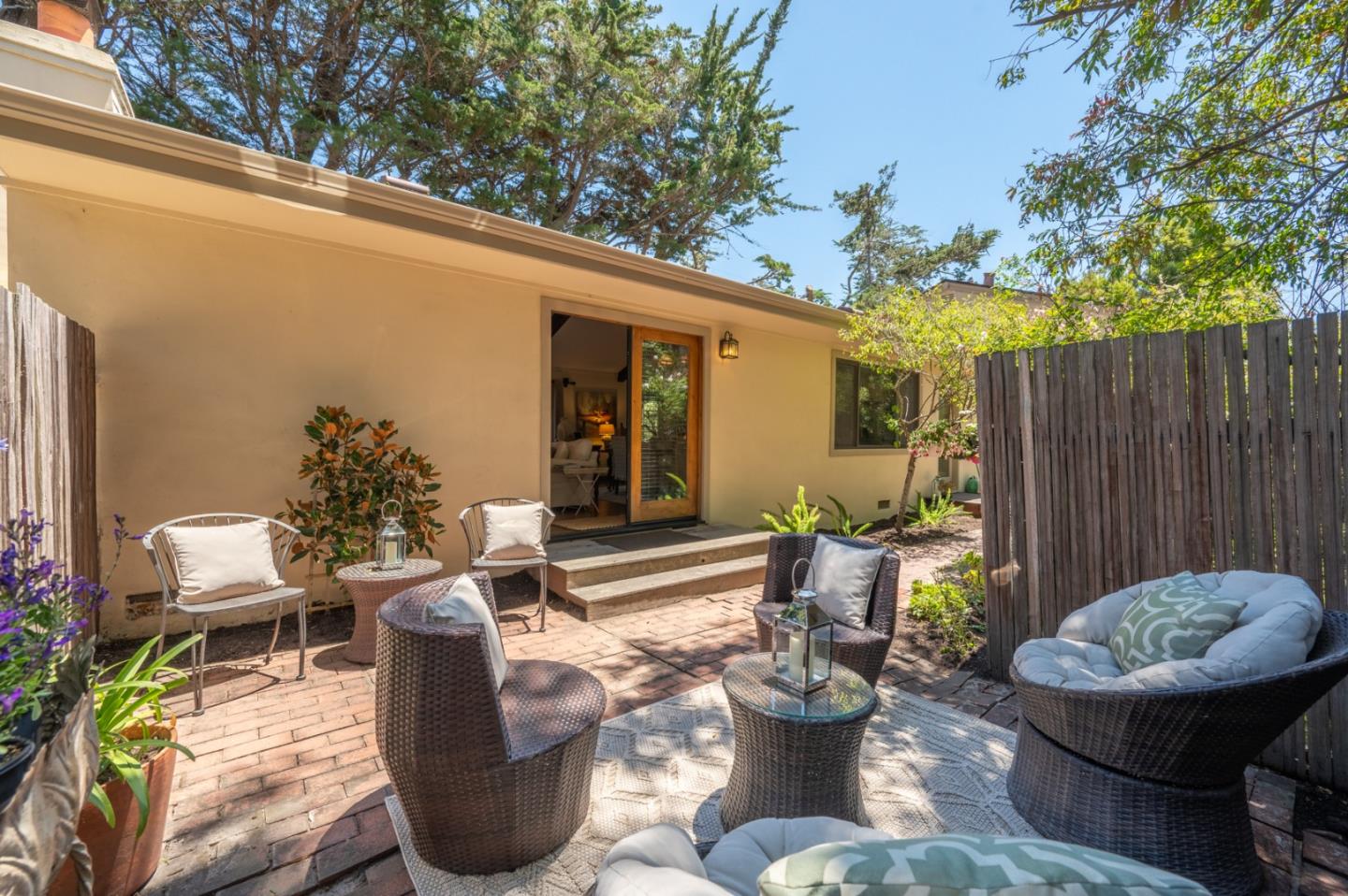 25324 Hatton Road Carmel, CA 93923 - Photo 9 of 19 a view of a chairs and table in backyard