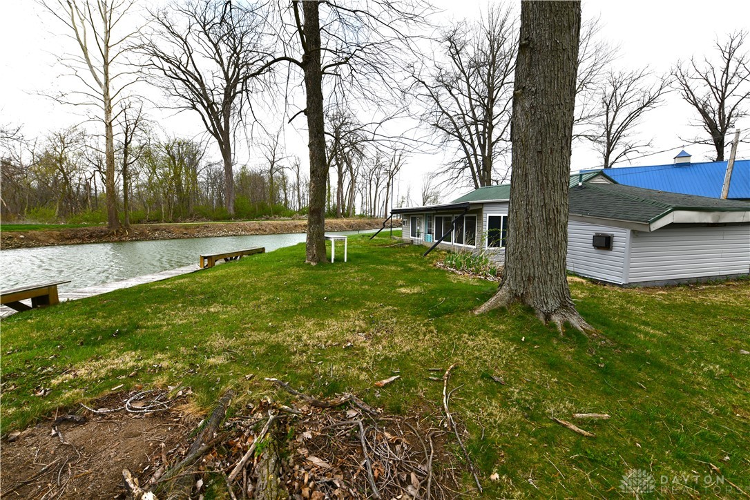 5445 Behm Road, Unit 15 Celina, OH 45822 - Photo 40 of 49 This charming lakeside retreat offers serene waterfront views and a verdant landscape.