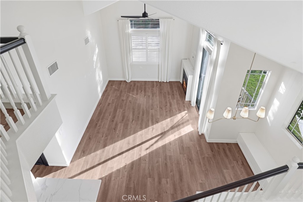 19 Garrison Loop Ladera Ranch, CA 92694 - Photo 16 of 21 a view of a living room with furniture and a window