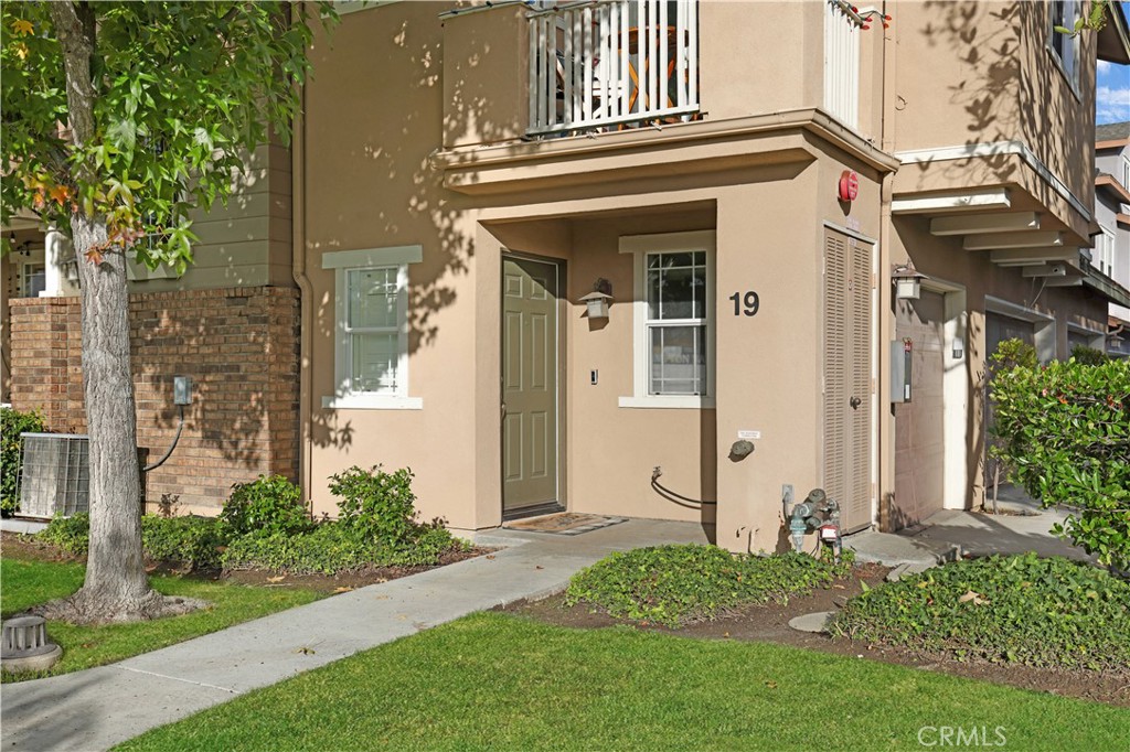 19 Garrison Loop Ladera Ranch, CA 92694 - Photo 20 of 21 front view of a house with a yard