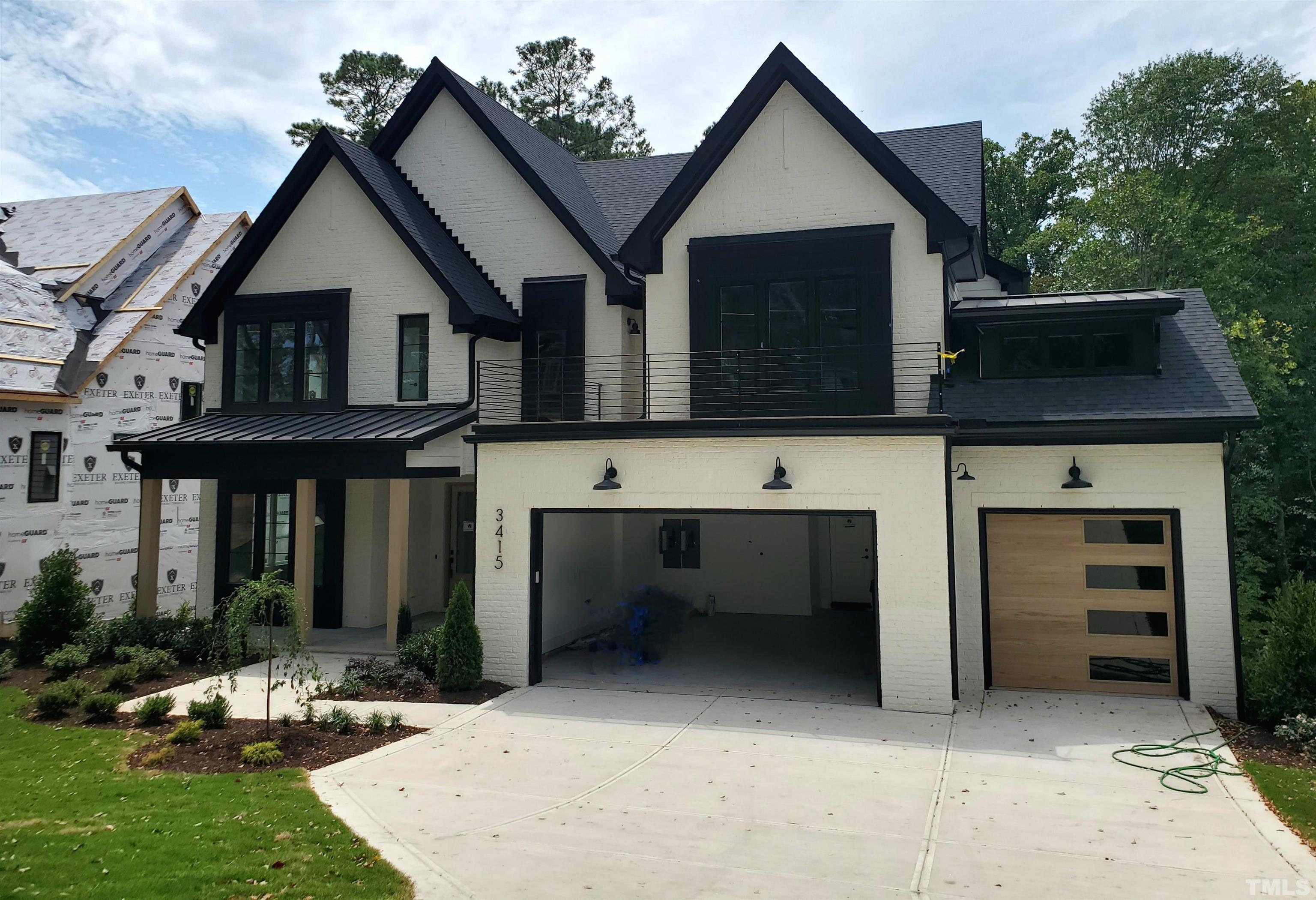 3415 Turnbridge Drive Raleigh, NC 27609 - Photo 3 of 9 a view of a house with a yard and porch