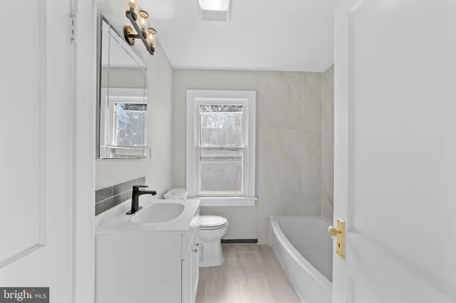a bathroom with a bathtub