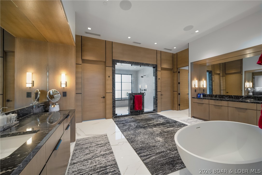 245 Waterview Ridge Sunrise Beach, MO 65079 - Photo 12 of 43 Dual Vanities, Walk In Closets and Toilet Closets