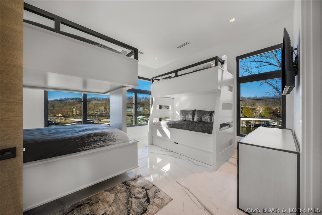 245 Waterview Ridge Sunrise Beach, MO 65079 - Photo 16 of 43 Upper Level Guest Suite with Custom Bunks